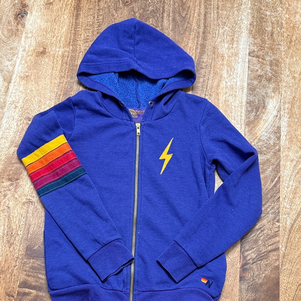 Aviator Nation Blue Hoodie with Lightning Bolt and Striped Sleeve
